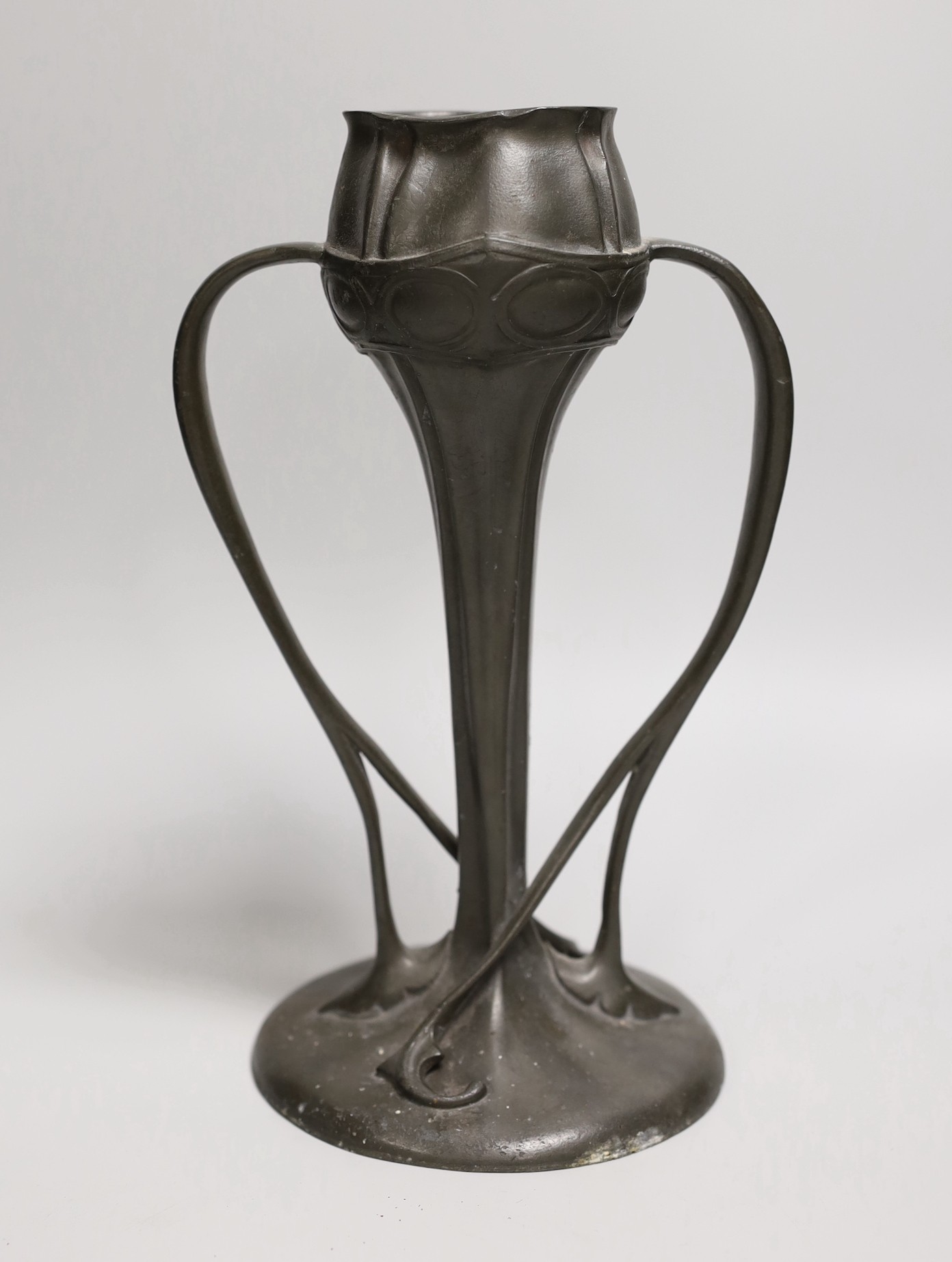 A Liberty & Co. Tudric pewter posy vase, designed by Archibald Knox, 25cms high